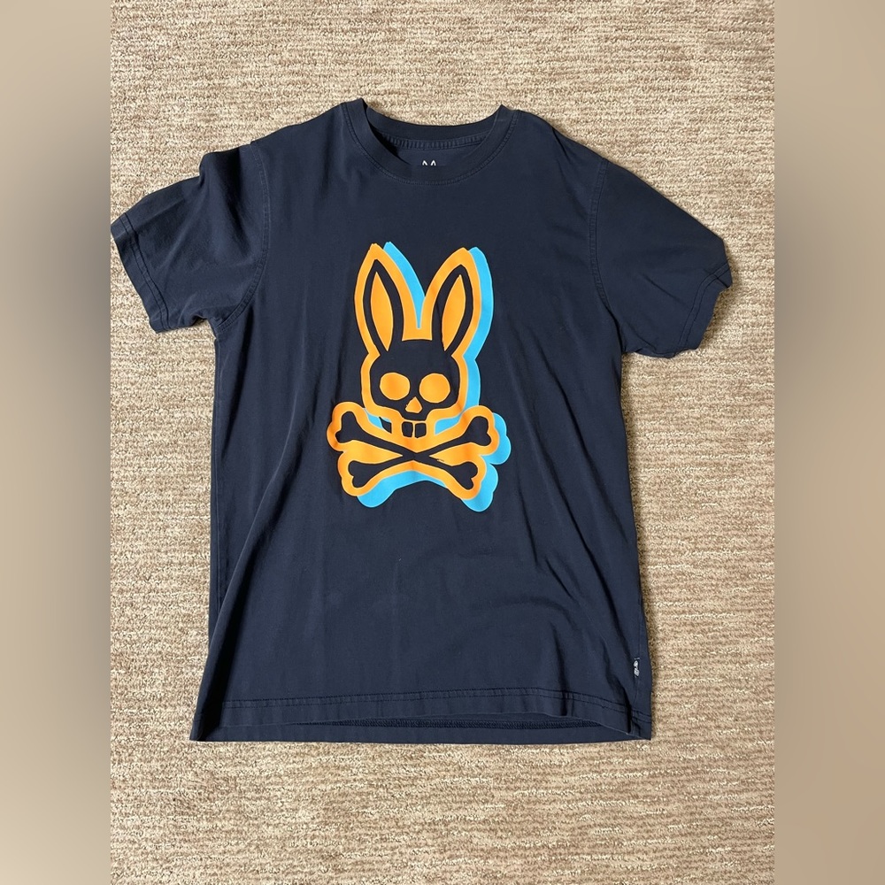 Men Pyscho Bunny tee shirt. Size: 4 (equivalent to small). Color: navy blue.